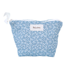 Petite trousse fleurs blanches sur fond bleu