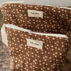 Sac à cosmétique brun fleuri